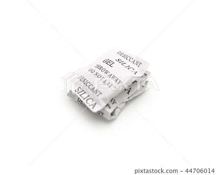 Silica gel packets isolated on a white background. Silica gel packets isolated on a white background. 44706014