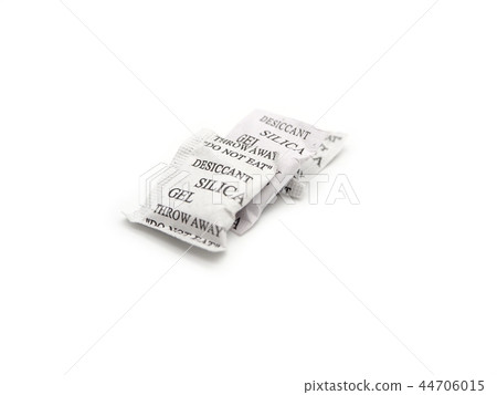 Silica gel packets isolated on a white background. Silica gel packets isolated on a white background. 44706015