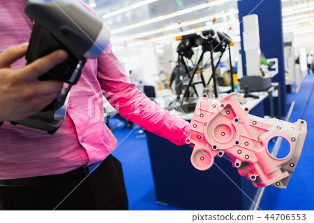 Engineer with 3D scanner 44706553