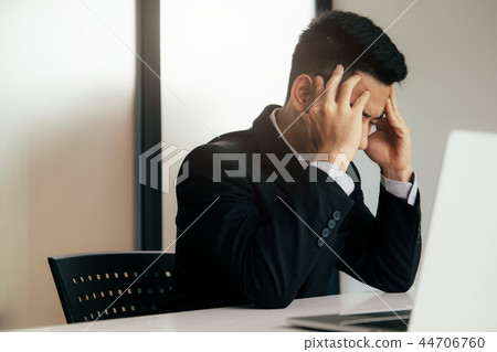 Stressed overwork business man in the office. Stressed overwork business man in the office. 44706760