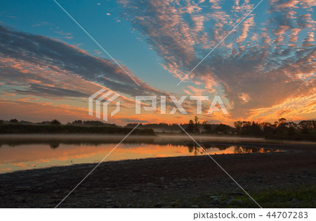 Fabulous sunrise over the lake in autumn Fabulous sunrise over the lake in autumn 44707283