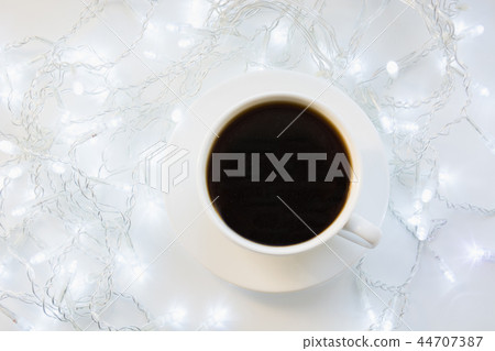 Cup of black coffee on winter white table.Xmas. 44707387