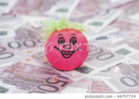 ball smiley face on the money 44707724