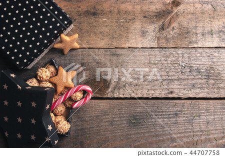 Star-shaped gift box full of sweets 44707758