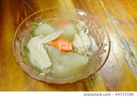 boiled winter melon with chicken wing and leg soup boiled winter melon with chicken wing and leg soup 44715596