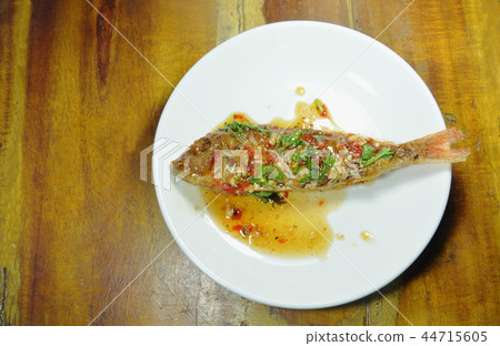 crispy fried sharp tooth snapper dressing sauce 44715605