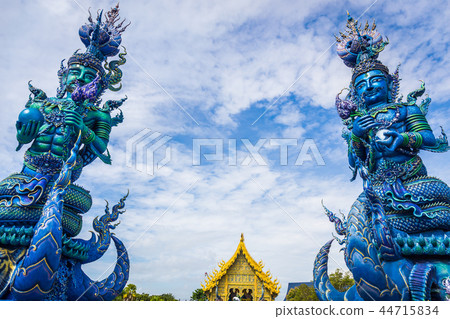 Pole carve of art fairy tale at Wat Rong Sua Ten  44715834