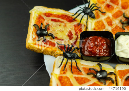 Funny sandwiches with spider and spider web Funny sandwiches with spider and spider web 44716190