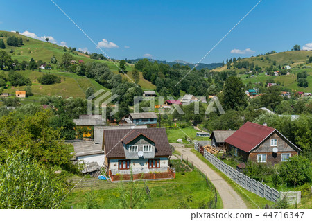 The panorama was between hills with green streets 44716347