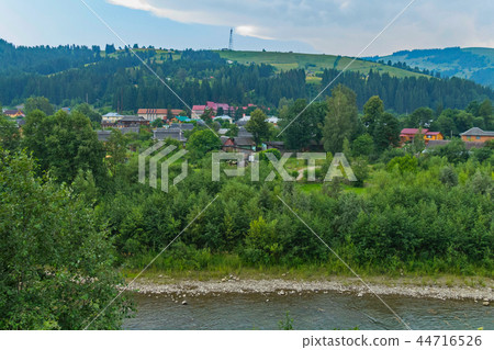 the flow of the river with stony shores near the r the flow of the river with stony shores near the r 44716526