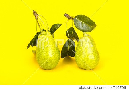 Sweet ripe fruit on bright paper background 44716706