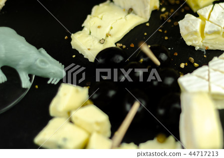 A set of cheeses served in a special form 44717213