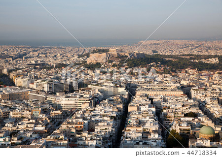 woman with a map sitting on Lycabettus Hill woman with a map sitting on Lycabettus Hill 44718334