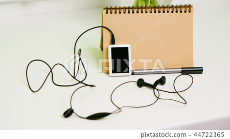 Music player, pen and notebook Music player, pen and notebook 44722365