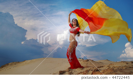 Oriental Beauty belly dancing outdoors 44722445