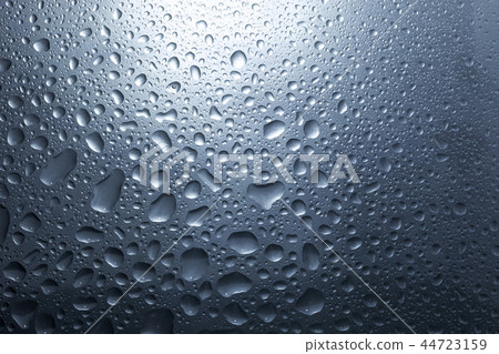 Water drops on dark wall and light Water drops on dark wall and light 44723159