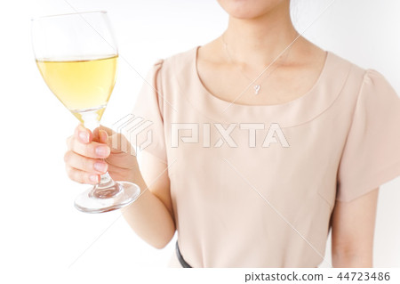 A woman drinking alcohol A woman drinking alcohol 44723486