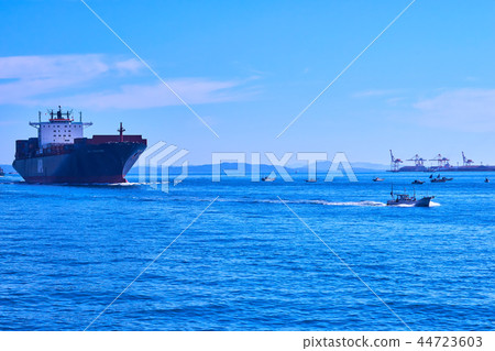 Container ship and fishing boat 44723603