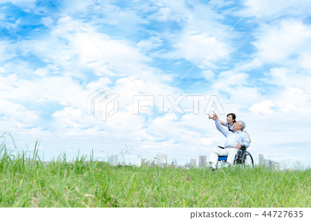 Senior man, young woman, caring Senior man, young woman, caring 44727635