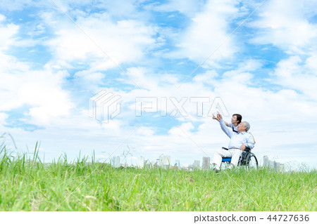 Senior man, young woman, caring Senior man, young woman, caring 44727636