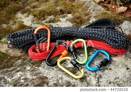 Metal carabine and rope . 44728528