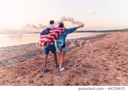 american couple with hand flare or fusee 44729435