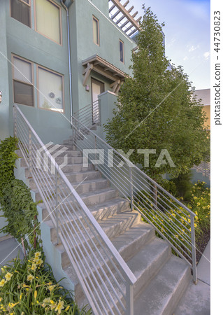 Stairs on a modern townhome entry 44730823