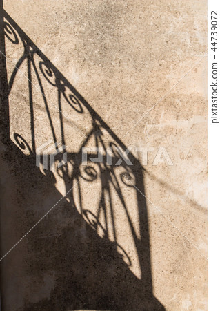 Fasade of a house with a shadow of the staircase 44739072
