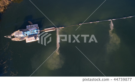 On the river there are works on extraction of sand. Works dredge 44739877