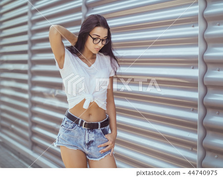 Casual summer retro look. Attractive girl outdoor Casual summer retro look. Attractive girl outdoor 44740975