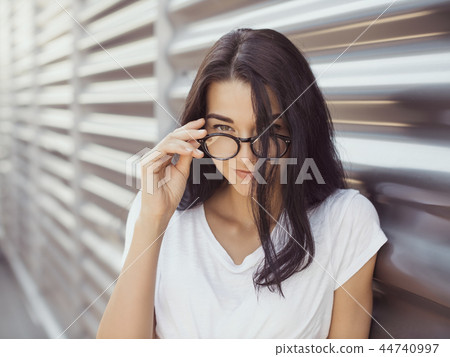 Casual summer retro look. Attractive girl outdoor Casual summer retro look. Attractive girl outdoor 44740997