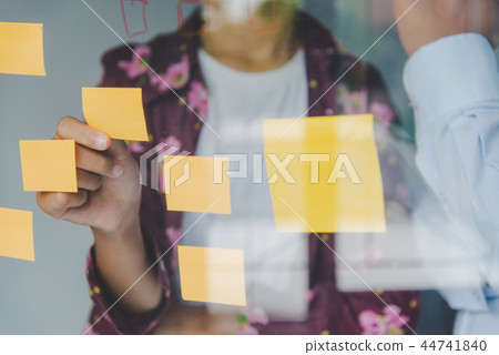 Businessmen are presenting her ideas Businessmen are presenting her ideas 44741840
