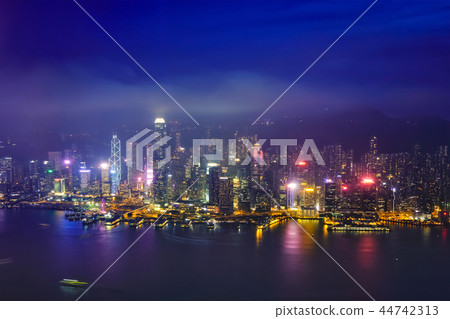 Aerial view of illuminated Hong Kong skyline. Hong Kong, China 44742313