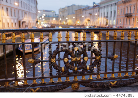 Fence of Bolshoy Konyushenny Bridge in Saint Petersburg, Russia 44743893