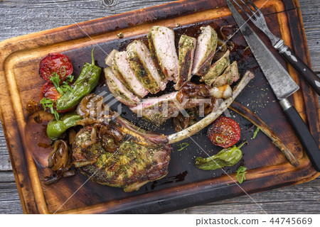 Barbecue tomahawk pork steak with vegetable Barbecue tomahawk pork steak with vegetable 44745669