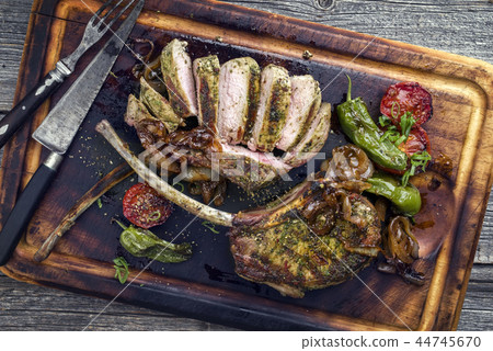 Barbecue tomahawk pork steak with vegetable Barbecue tomahawk pork steak with vegetable 44745670