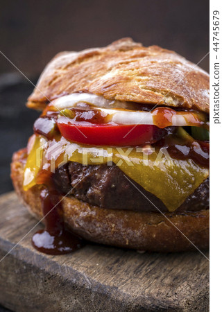 Barbecue Wagyu cheeseburger with onions and tomato 44745679