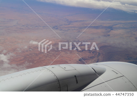 Sky and clouds over the USA taken from a plane (near the Grand Canyon) Sky and clouds over the USA taken from a plane (near the Grand Canyon) 44747350