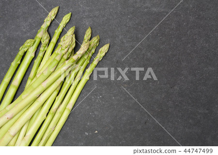 bunch of asparagus over slate bunch of asparagus over slate 44747499