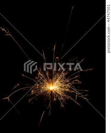 sparkler on black background sparkler on black background 44747501