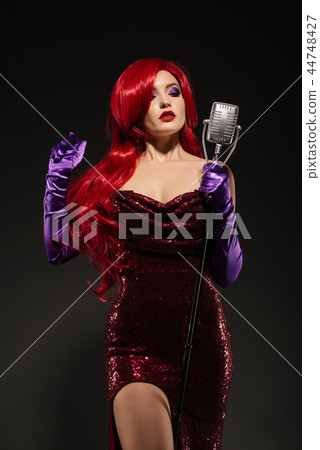 Young beauty redhead woman with very long hair  44748427