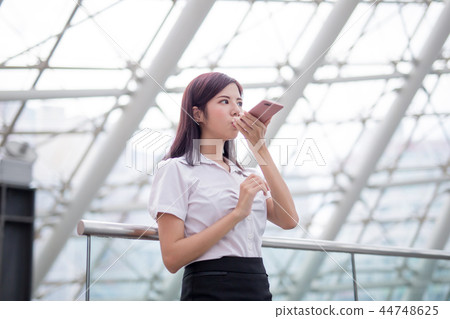 business woman send audio message 44748625