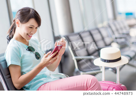 woman use phone happily woman use phone happily 44748973