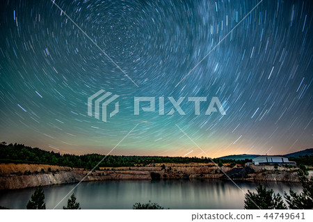 Circumpolar and abandoned slate mine pool at night 44749641