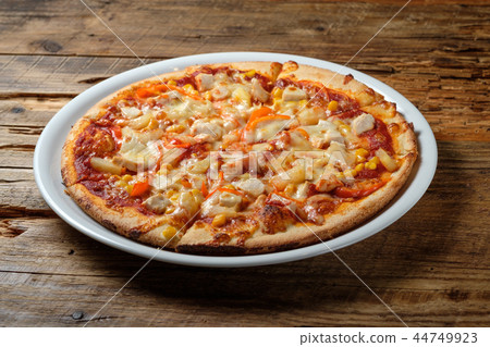 Pizza with chicken, corn and pineapple 44749923