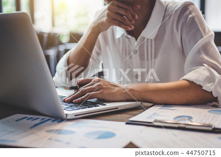 Professional at work, business woman working and analysis on lap 44750715