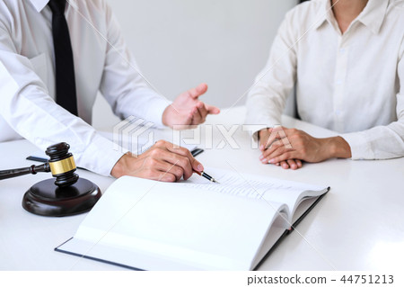 Businesspeople or lawyer having team meeting discussing agreemen 44751213