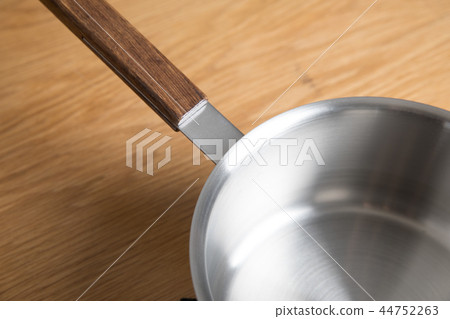 Stainless steel pot in the kitchen Stainless steel pot in the kitchen 44752263