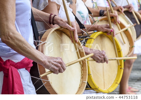 Womans drum players hands and instrument 44753118