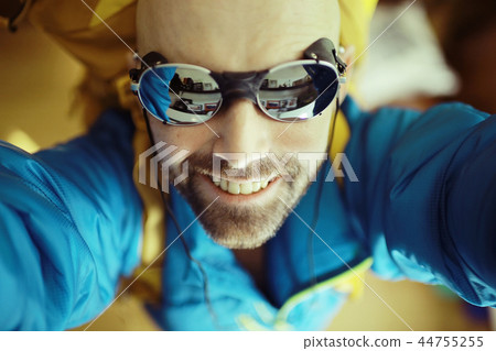 Tourist bearded man in sunglasses, sport tourism, concept active leisure, male tourism, portrait of a brutal man in sportswear, middle-aged man Tourist bearded man in sunglasses, sport tourism, concept active leisure, male tourism, portrait of a brutal man in sportswear, middle-aged man 44755255
